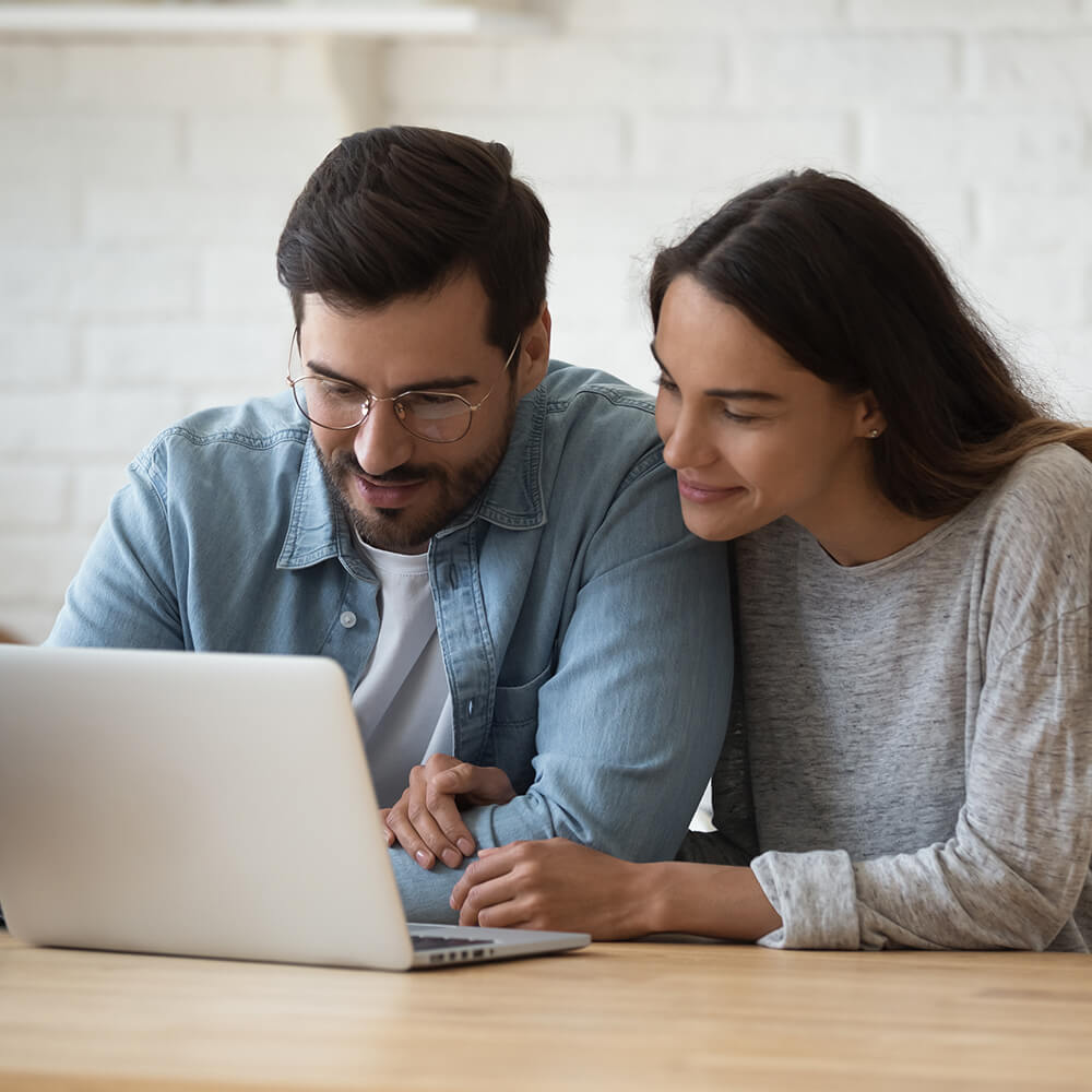 couple looking at laptop