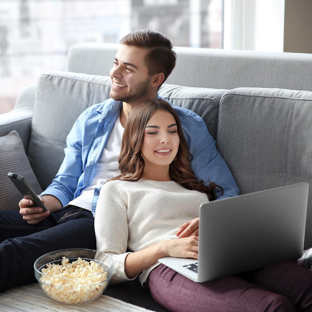 couple happy on sofa