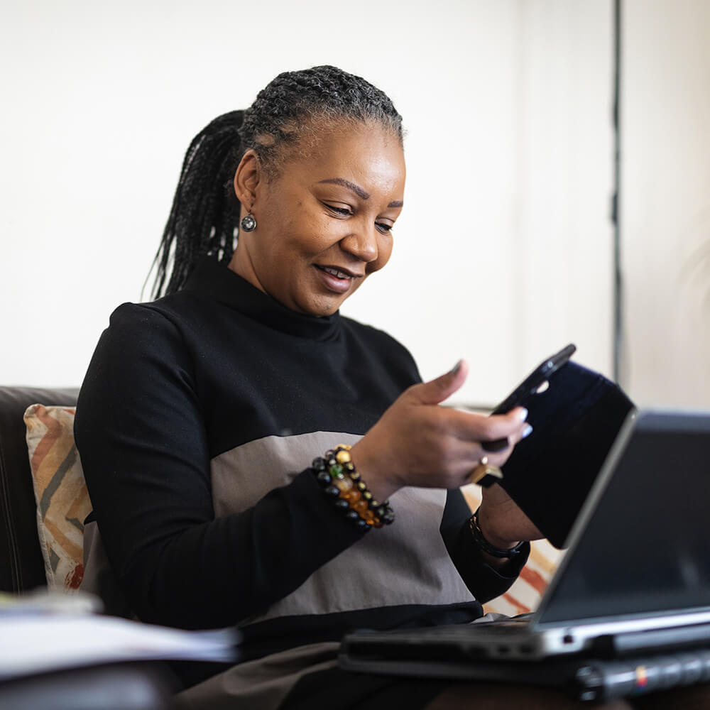woman reads her phone