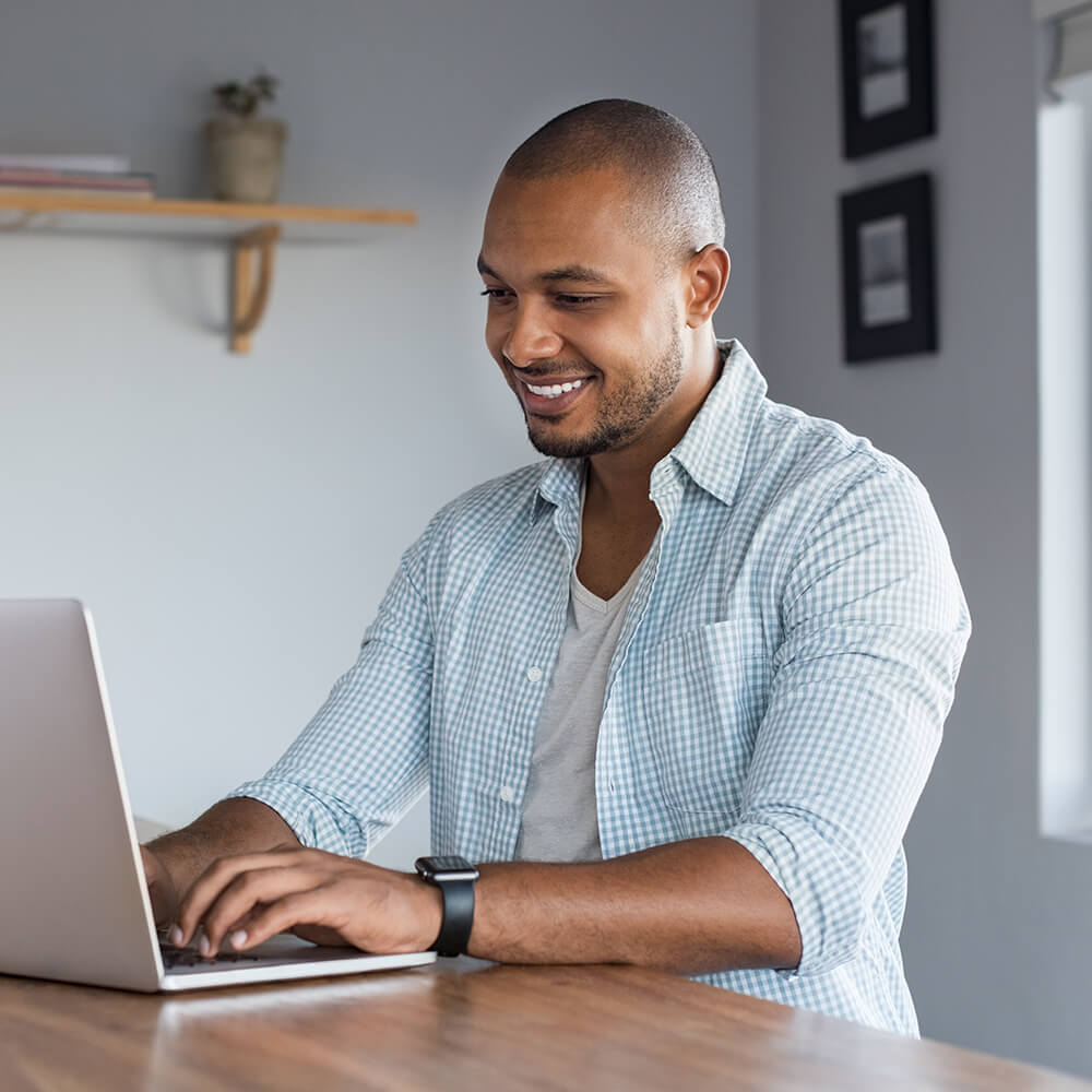 man using laptop