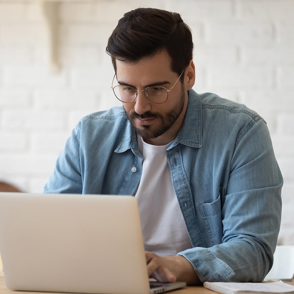 man using laptop