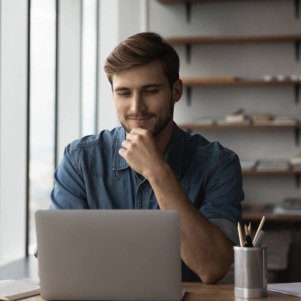 man using laptop