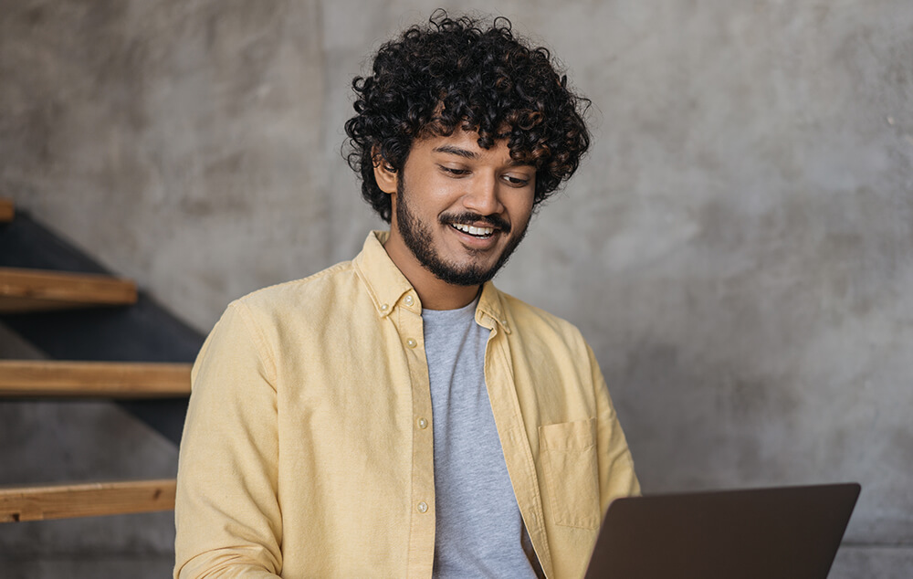 man using laptop