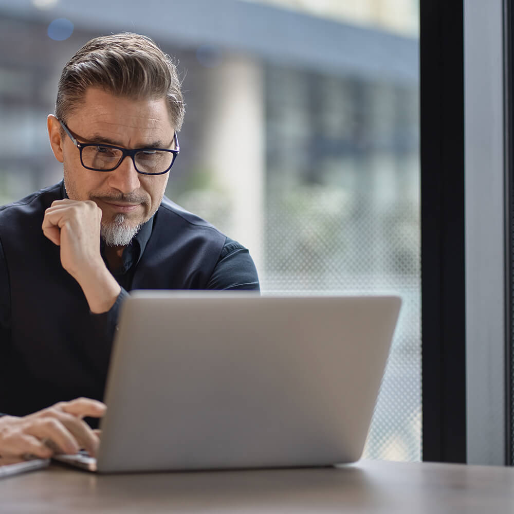 man using laptop