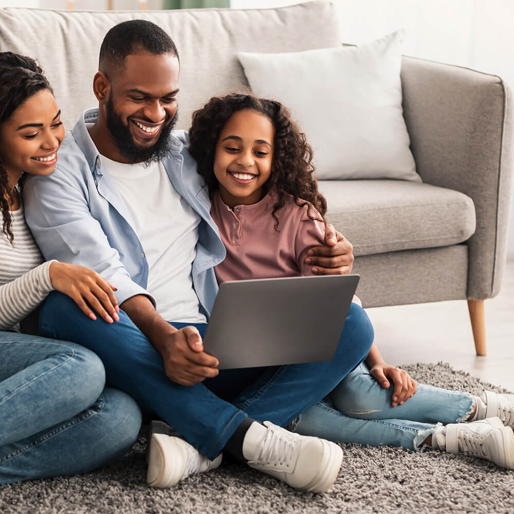 family using laptop