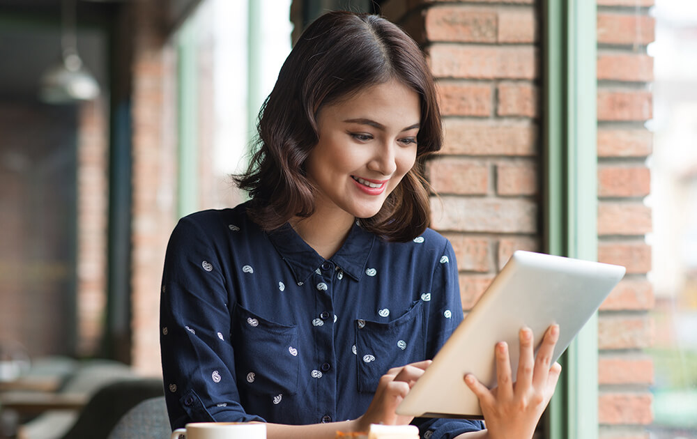 woman using tablet