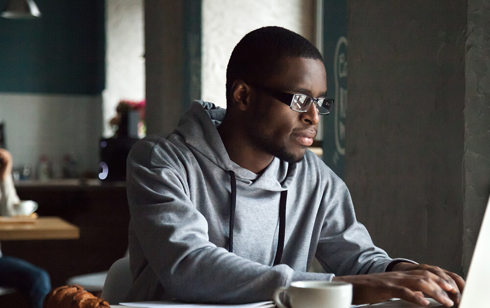 man using laptop
