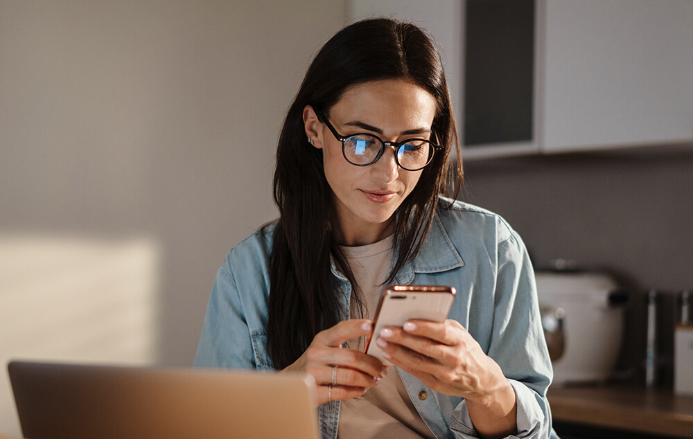 woman checking phone