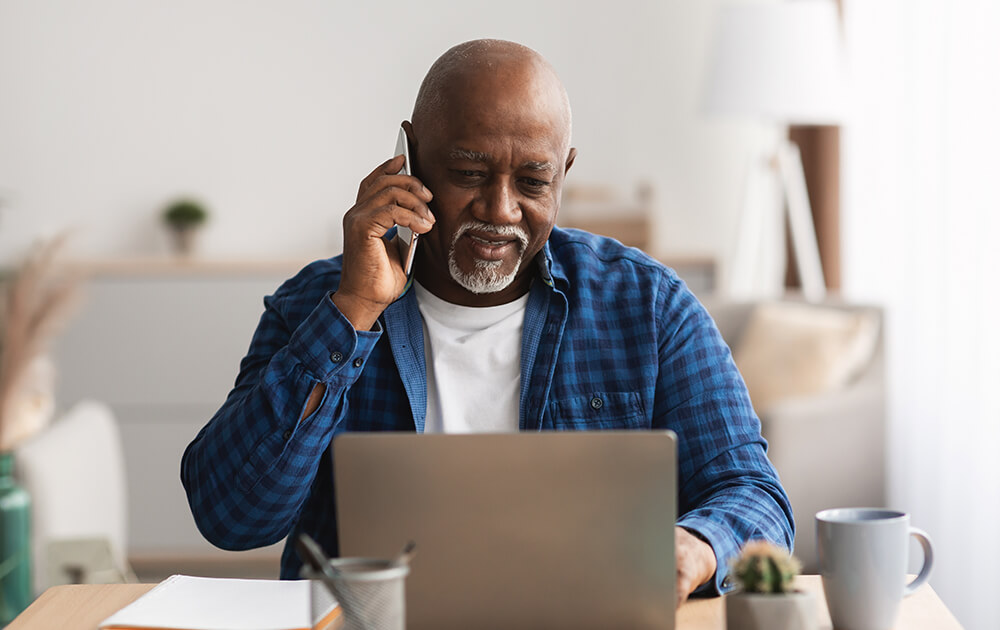 man using laptop