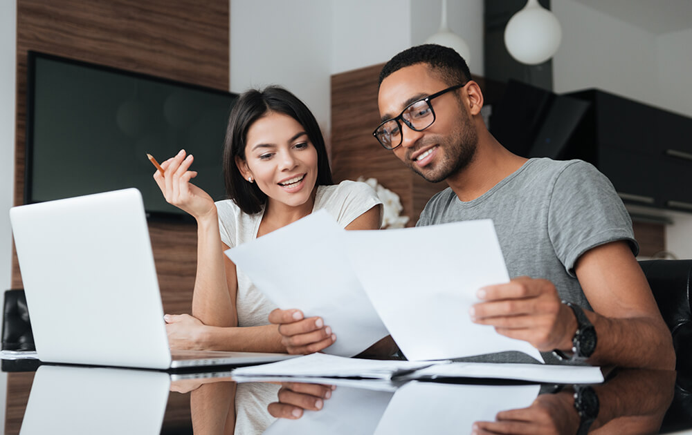 couple looking at loan application