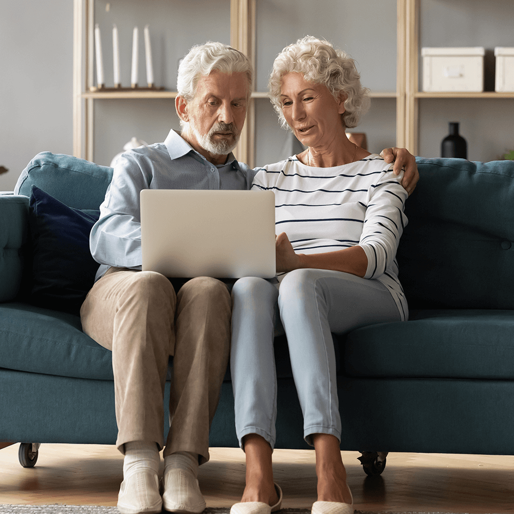 couple looking at laptop
